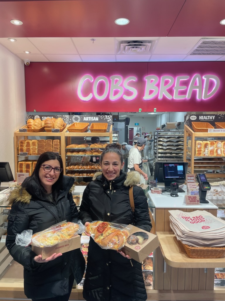 A photograph of Houry and Reta, "The First Moms to Enter the Newest COBS” 
