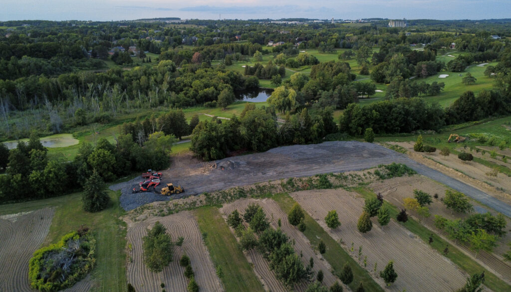 An aerial photograph showing a worksite at 6512 Bethesda Side Road. 