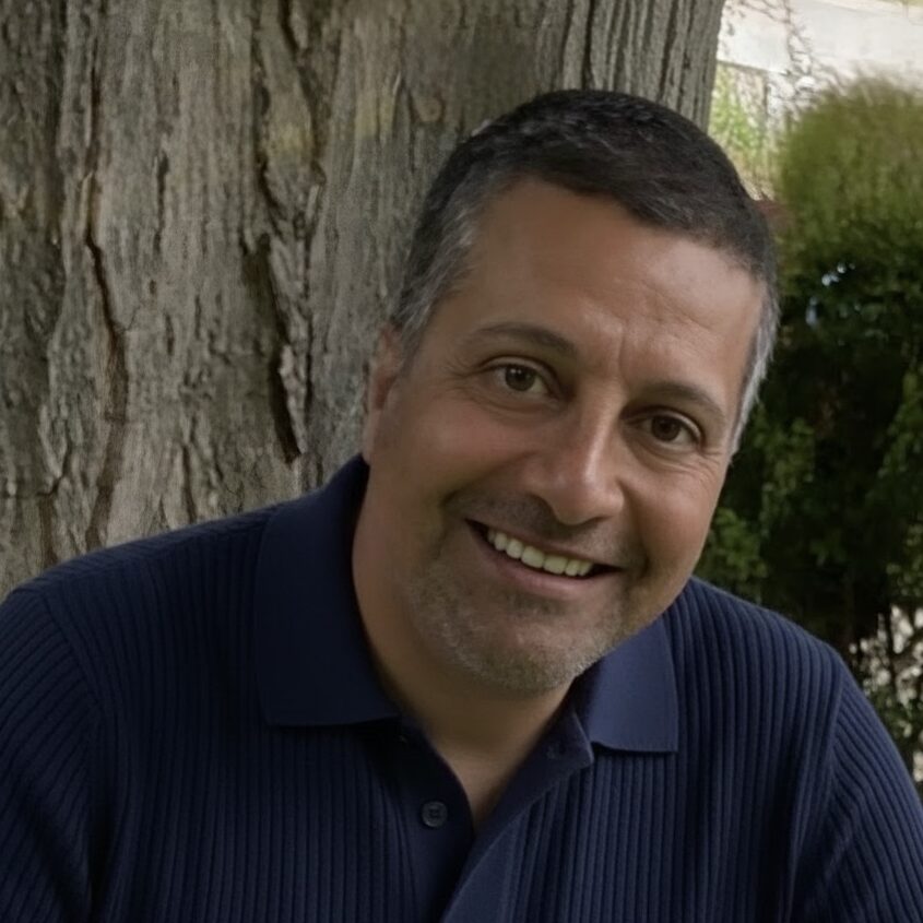 A headshot photograph of Bill Radia