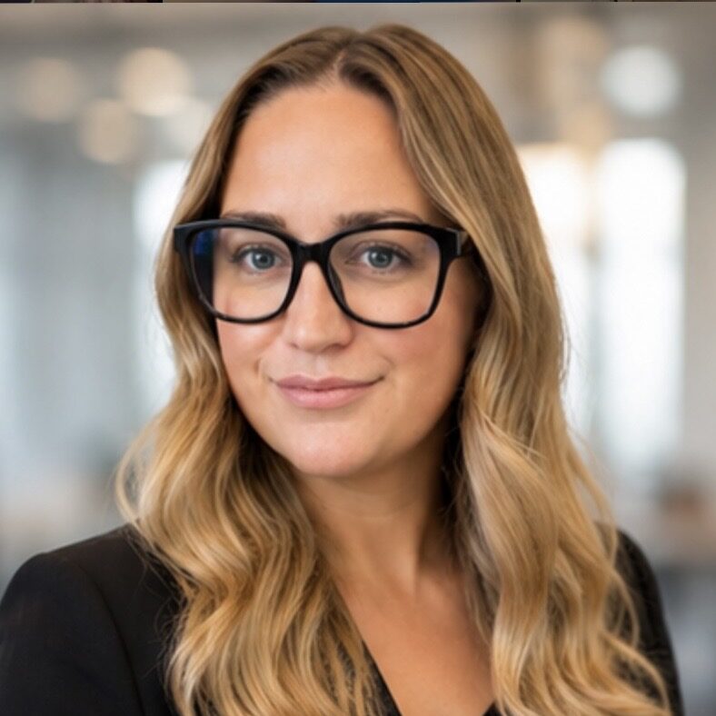 A headshot photograph of Emma Sears